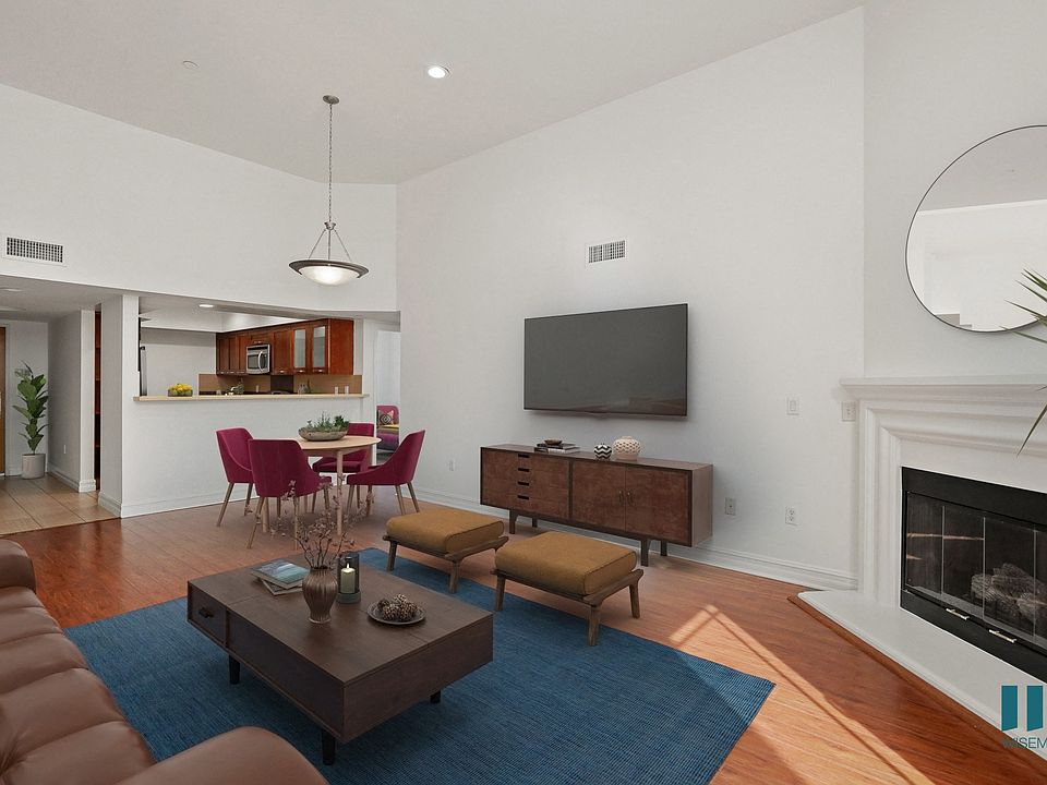 Kitchen, Dining, and Living Room with Electric Fireplace