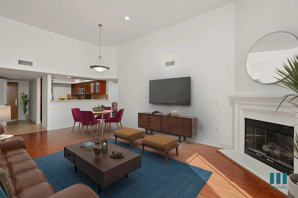 Kitchen, Dining, and Living Room with Electric Fireplace - Sherbourne Hall by Wiseman