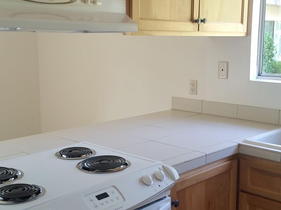 Sunny kitchen with lots of storage.