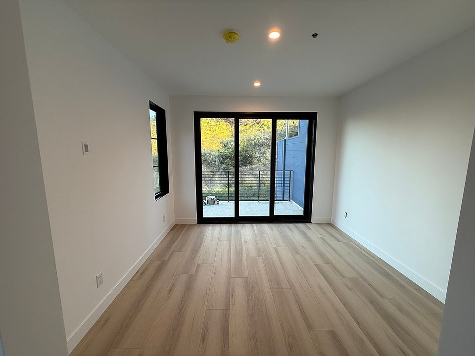 Downstairs office/bedroom with private balcony and peek-a-boo ocean views