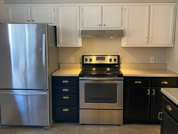 Kitchen. Fridge. Range. Microwave available upon request.