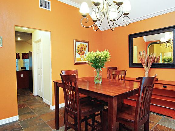 Dining Room - Perfectly located off the designer kitchen makes this dining room essential for simple family dining or an elegant affair! The slate floor adds a high-end touch!