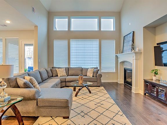 This great open floor plan has the dining area just to the left of the living area.
