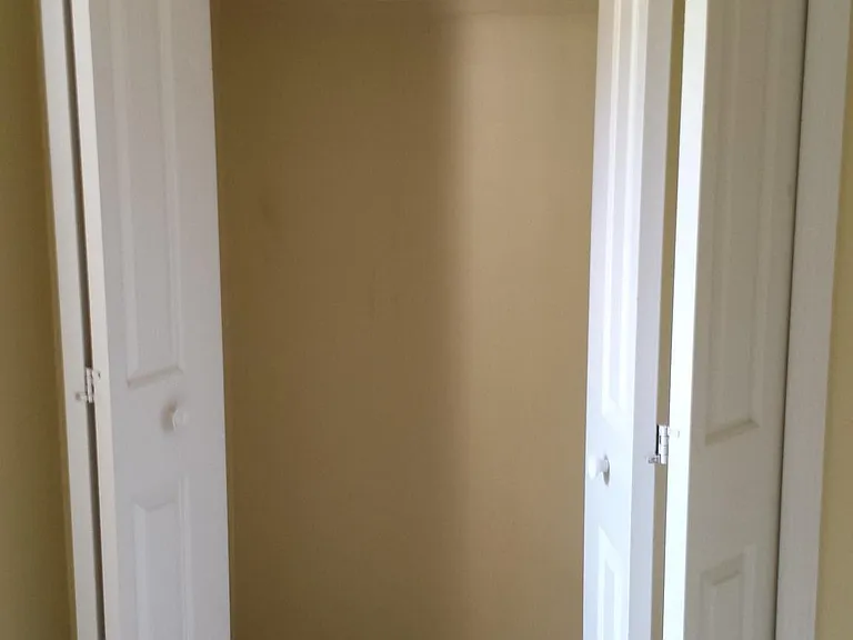 second bedroom closet (same in third bedroom)