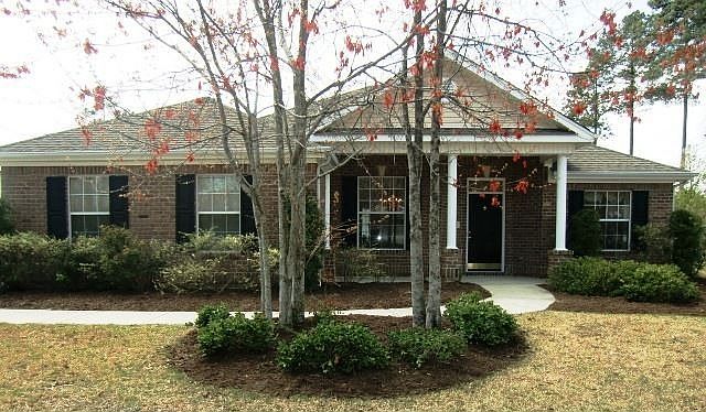Brick front golf home