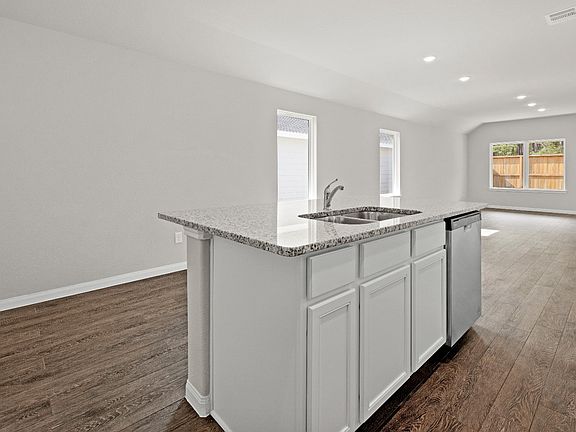 Kitchen to Dining Area and Family Room