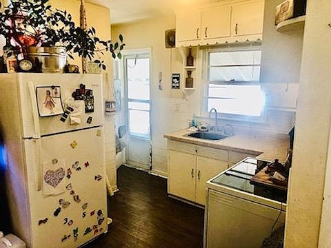 Kitchen with side door to the 3-season porch