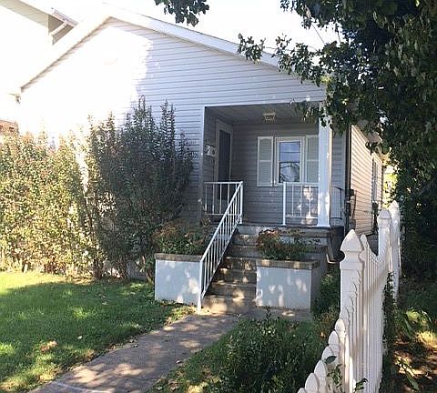 Front entrance. Picket fence