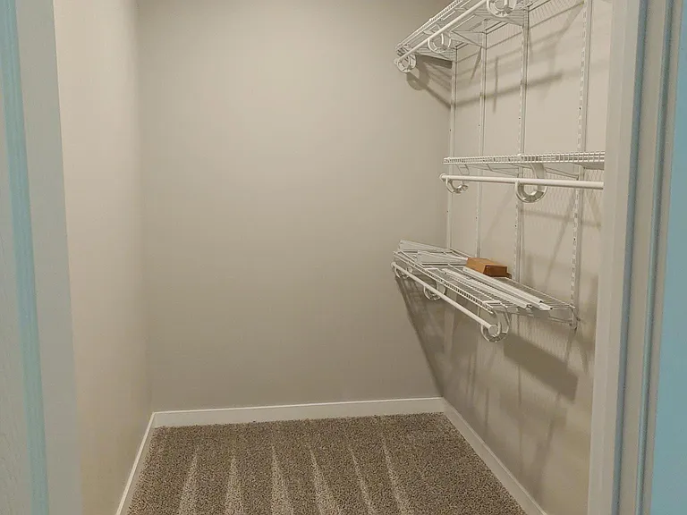 Walk in Closet in Master Bedroom Located on Main Floor.