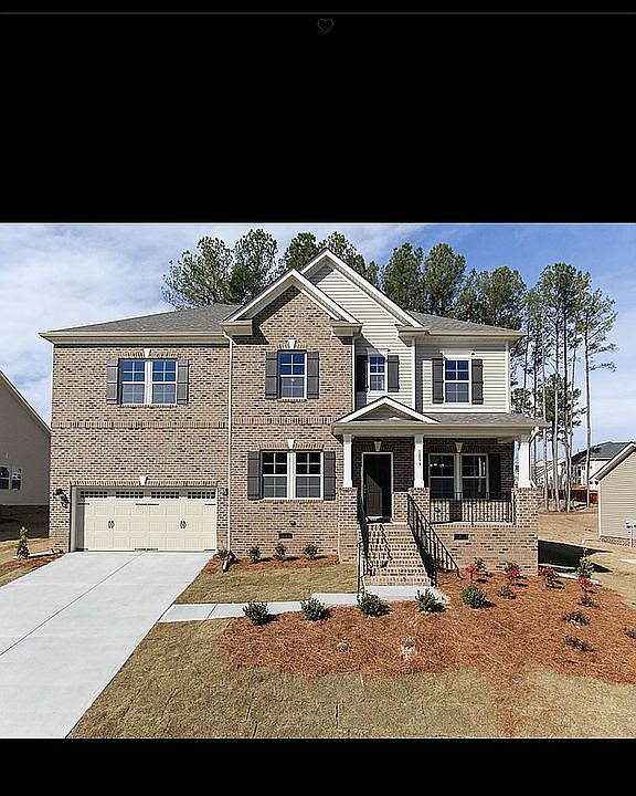 Brick front 6 bedroom home