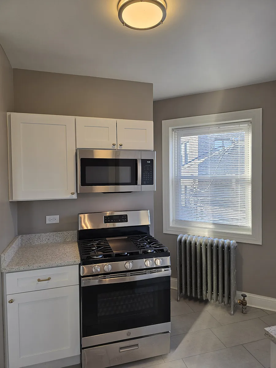 Building Photo - 7516 S Phillips Ave #2