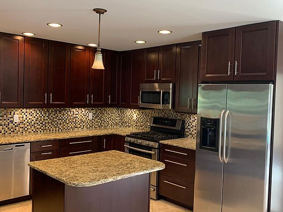 Kitchen gas stove and refrigerator