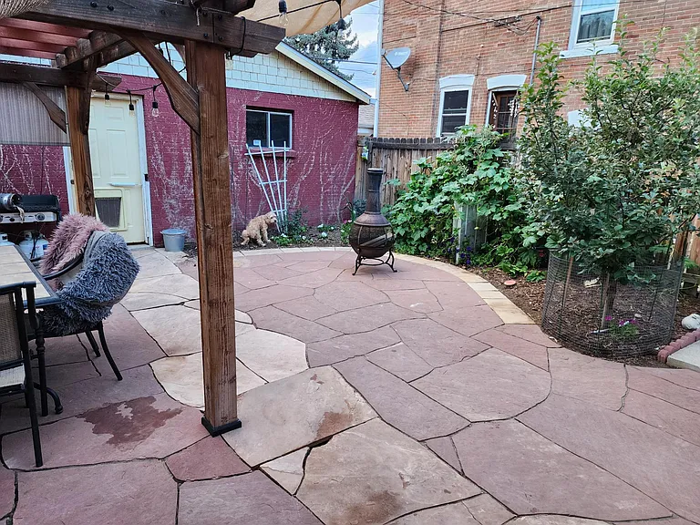 Back yard with two-car garage.