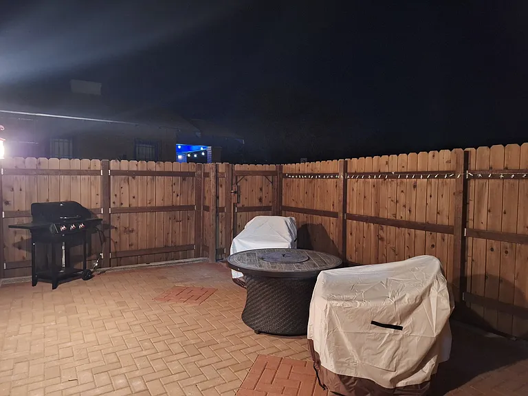 Private fenced patio with locked gate.