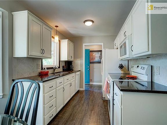 Another view of the kitchen looking towards the front door.