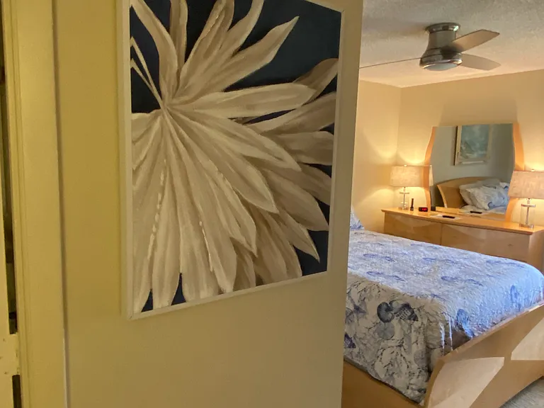Master Bath is to the left of this picture and the master bedroom is on the right