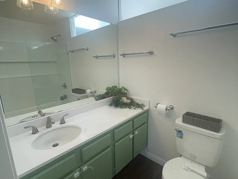 Bathroom of second Master includes bathtub with shower