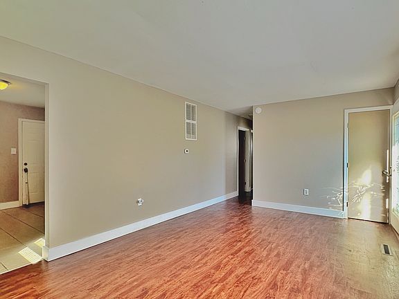 Living room with closet.
