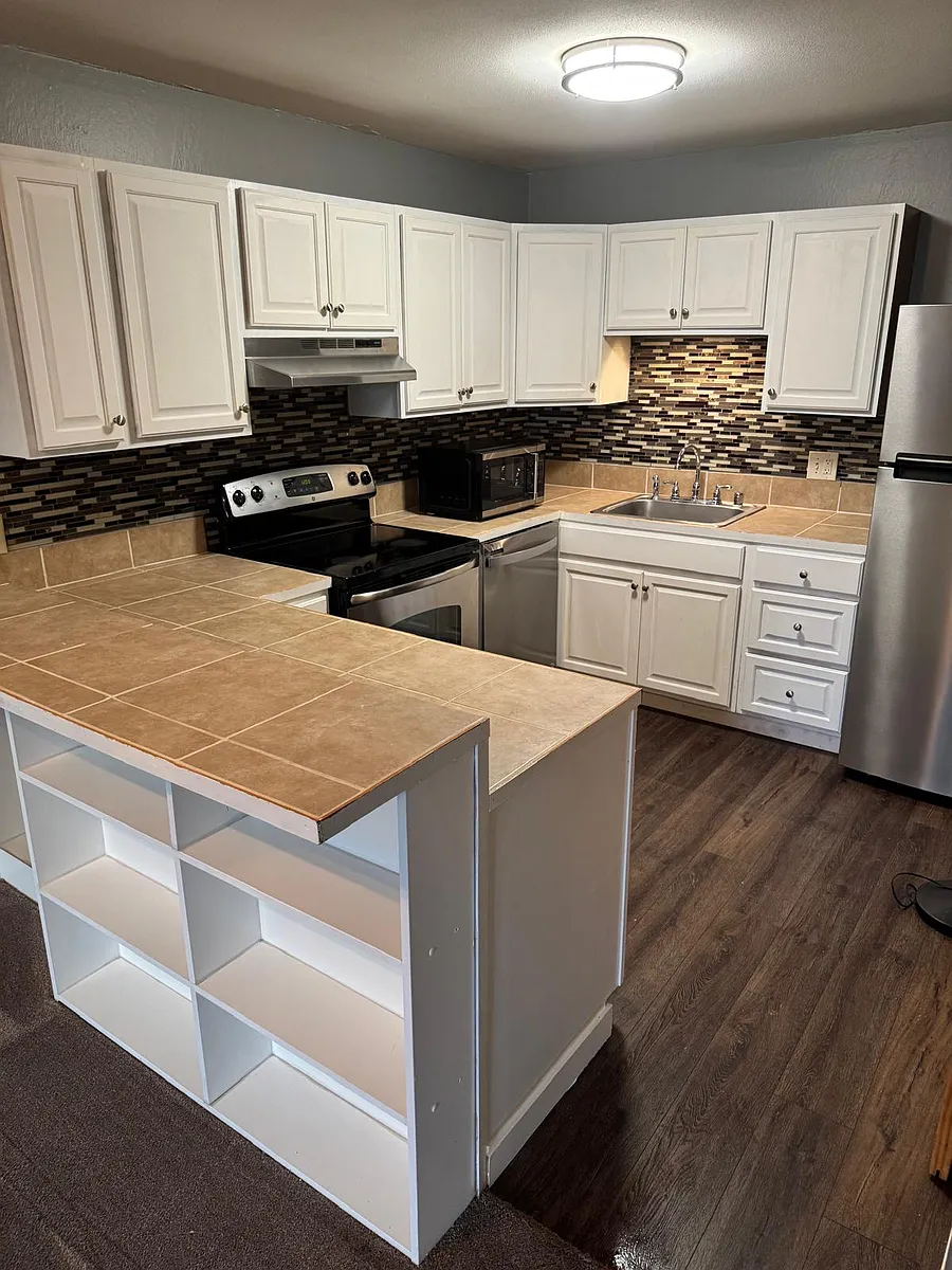 Building Photo - 1425 S Puget Dr #203
