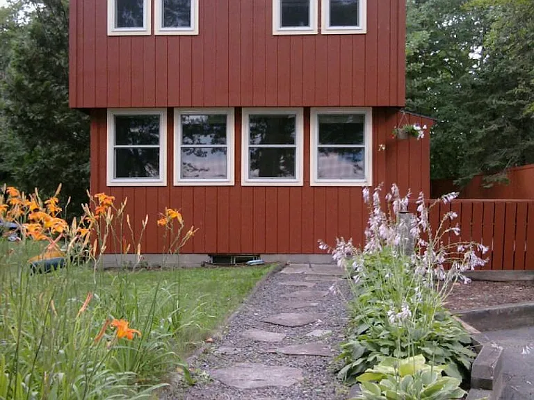 front of house with deck on the side