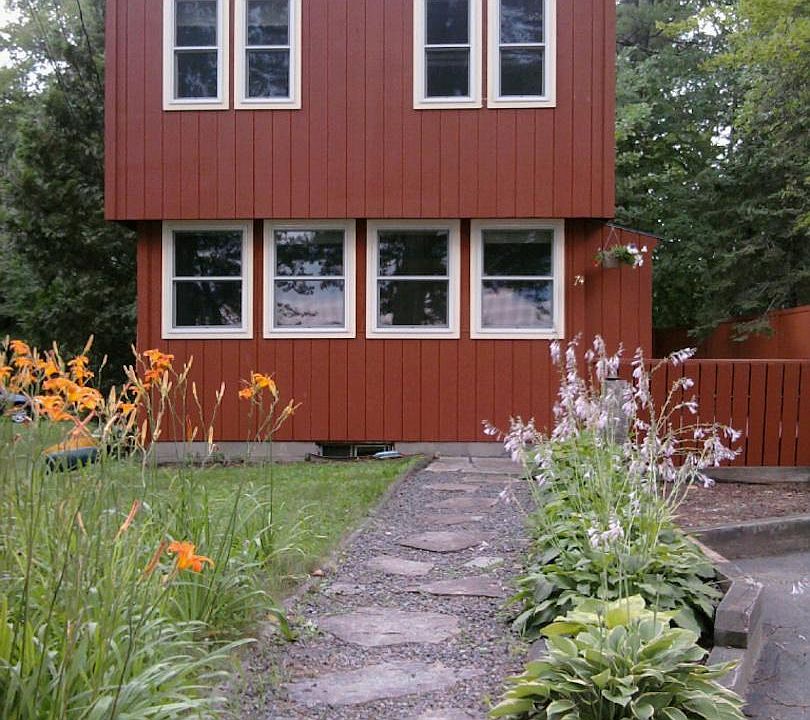 front of house with deck on the side