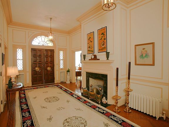 Grand foyer with fireplace