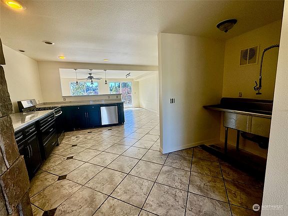 4th image of 8834 S Alaska Street