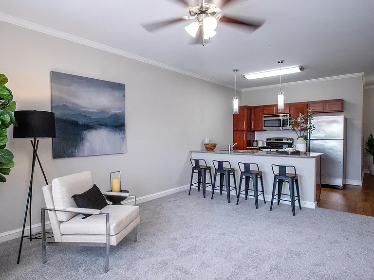 Experience the joys of spacious living with open floor plans, featuring large windows, ample lighting, and ceiling fans for ultimate comfort.