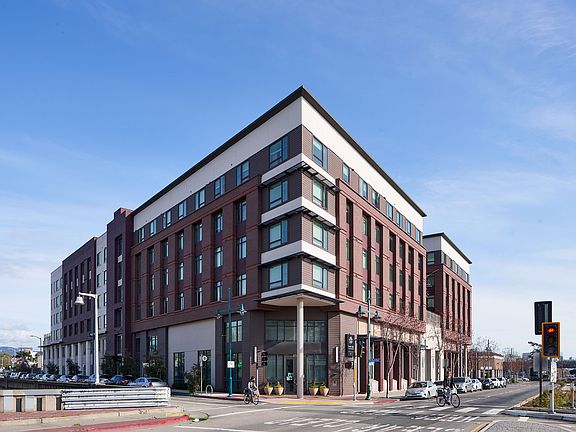 Striking corner property with contemporary architecture and easy access to transit and downtown amenities.