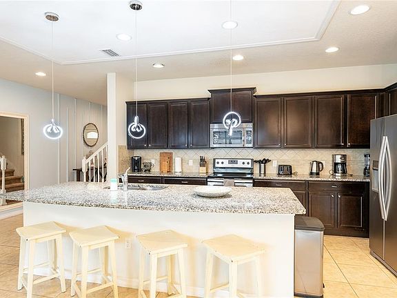 4th image of 9047 Rhodes St