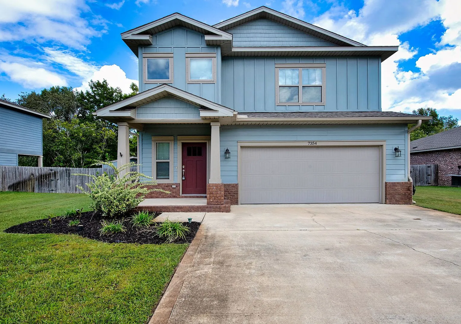 Two-Story Navarre Home with SOLAR, 2-Car Garage & Incredible Backyard! — Photo 1