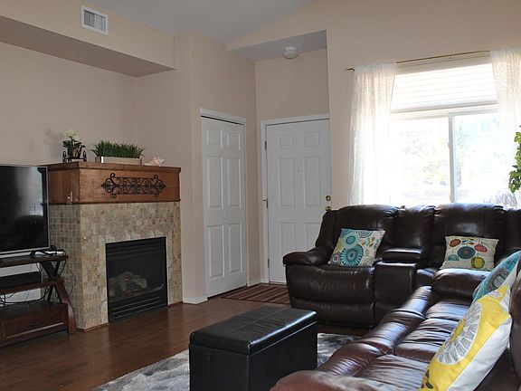 Main floor has engineered wood floors throughout, custom blinds and curtains