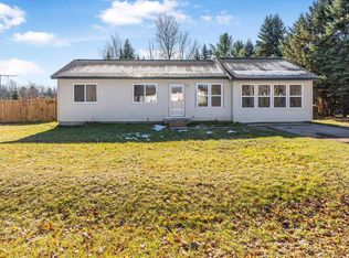 7423 Scotchwood Ln, Grawn, MI 49637