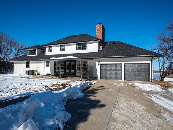 Attached two car garage and spacious backyard (*now fully fenced*) with covered patio