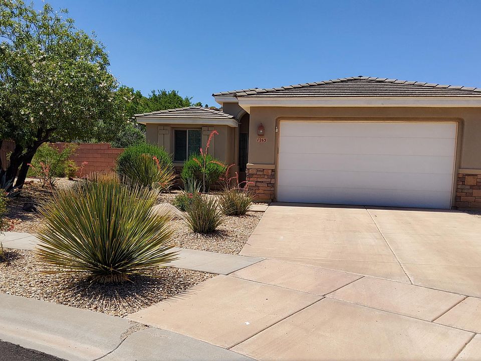 Low maintainence yard and gated additional parking area