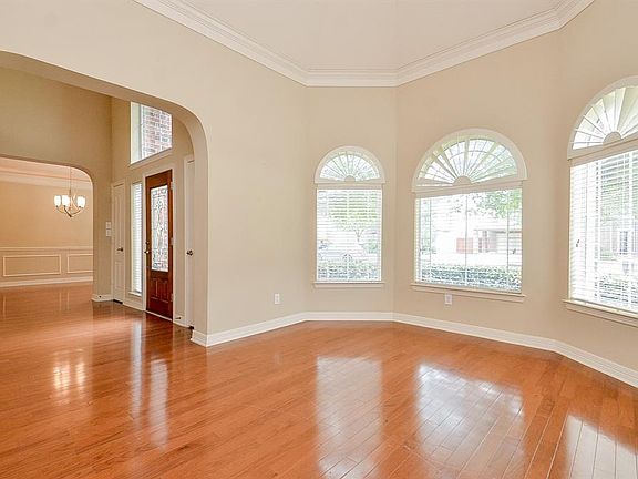 Directly to the left is this wonderful flex space which features a triple window. Space can be used as a formal living room, study, school room, music room or whatever works best for your family. You choose!