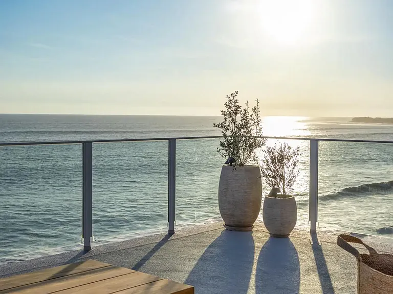 Breathe in the coastal air from the spacious deck_a private sanctuary overlooking the Pacific.