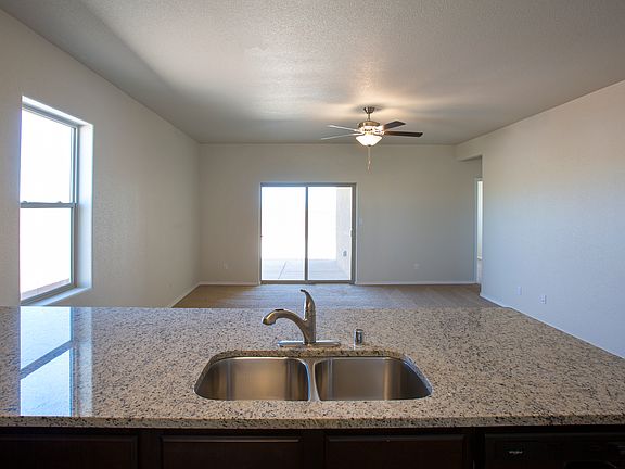 Kitchen Overlooks Large Family Room