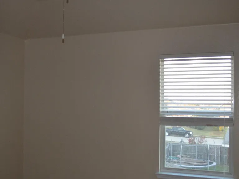 Upstairs bedroom (all 3 are similar size and color)