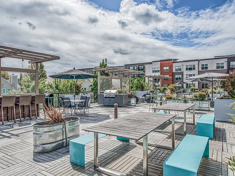 Plenty of outdoor seating, furniture, and a bar