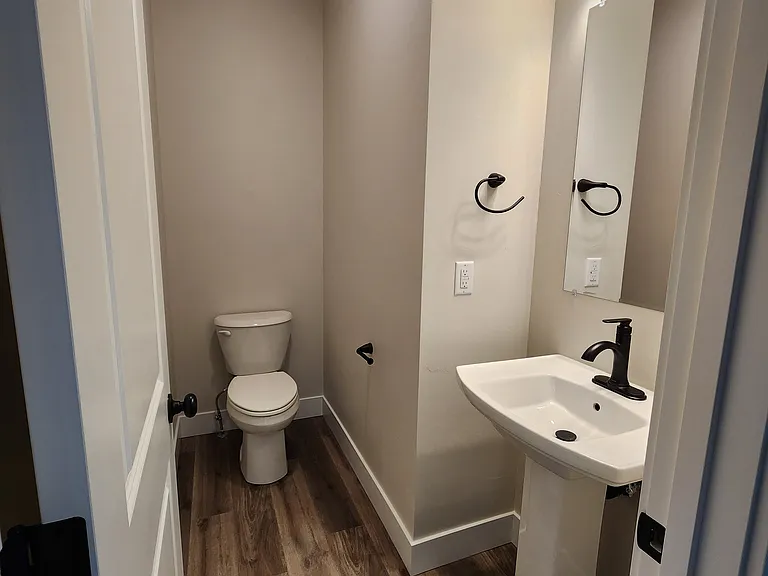 Downstairs bathroom conveniently tucked away.