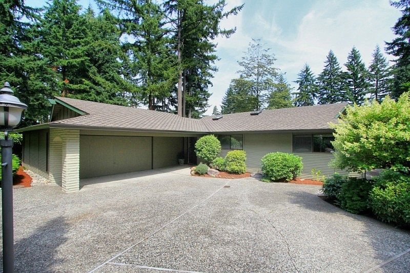This northwest style house is available for the first time since 1972. The community of Las Florestas (The Forests) is set among tall Douglas Fir trees and located four blocks east of Bel-Red Road (and Microsoft). The unique community of custom houses by Berg & Ford includes a .71 acre tract of land that the residents care for. Pride and respect keep this a beautiful neighborhood and not HOA rules. 