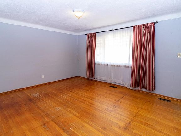 Wood floors and coved ceiling in the living room
