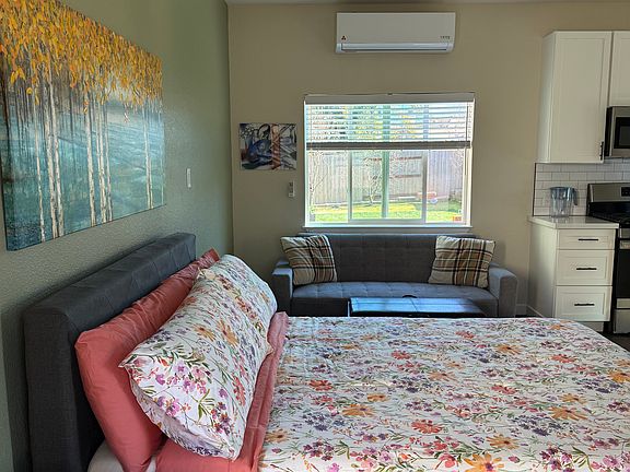 Big east side window facing backyard brings in lot of natural light to bask in throughout the day.