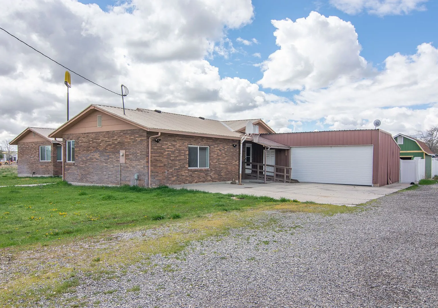 Spacious 3 Bed 2 Bath Brick Home with RV Parking, Shop Space & Large Yard in Tremonton! — Photo 2