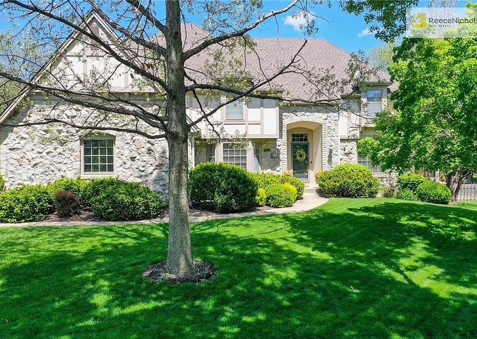 Beautiful curb appeal with stone front and 3-car side entry garage