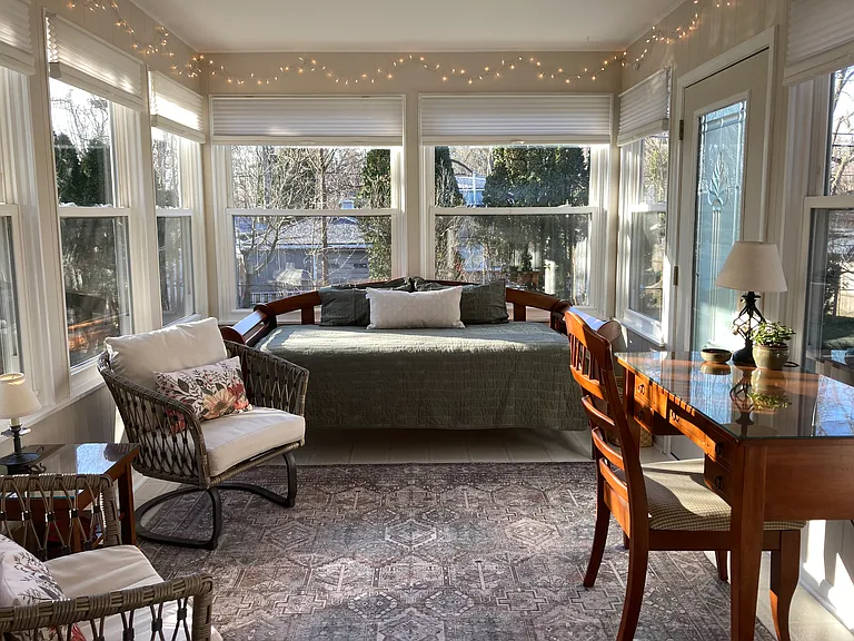 "The bonus for us was the sunroom. We opened the windows in the morning and listened to the lovely sounds of nature as we ate breakfast in the sun." Christine, W., Toronto, Canada, Red Maple Retreat Guest