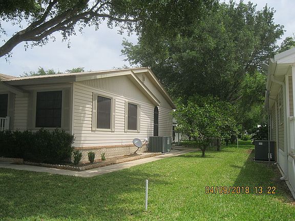 South side w/2 orange trees