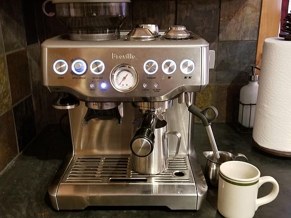 Espresso maker, French press, Coffee maker provided.