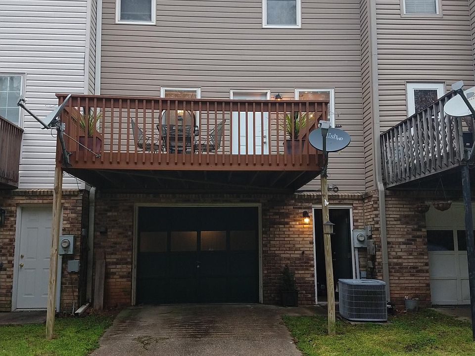 Back of the house. Back deck above garage.